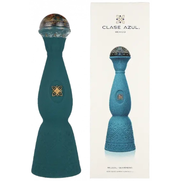 Clase Azul Mezcal Guerrero 0,7l in handgefertigter grüner Keramikflasche mit kunstvollem Kolibri-Verschluss neben Originalverpackung